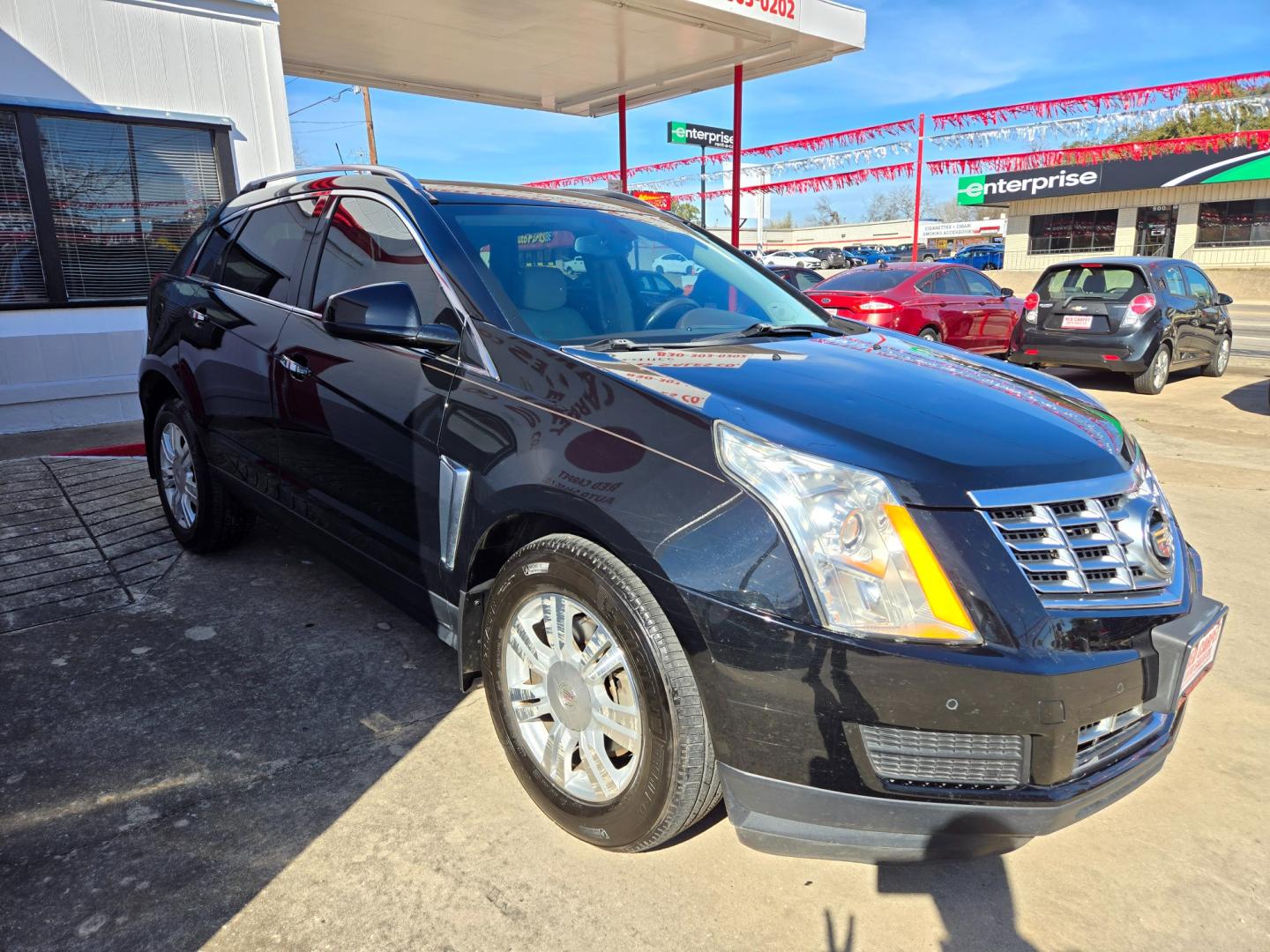 2015 BLACK Cadillac SRX (3GYFNBE37FS) with an 3.6L V6 F DOHC 24V engine, Automatic transmission, located at 503 West Court, Seguin, TX, 78155, (830) 379-3373, 29.568621, -97.969803 - Photo#1